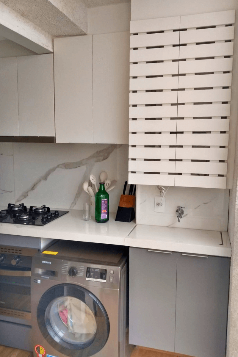 Lavanderia planejada organizada e funcional